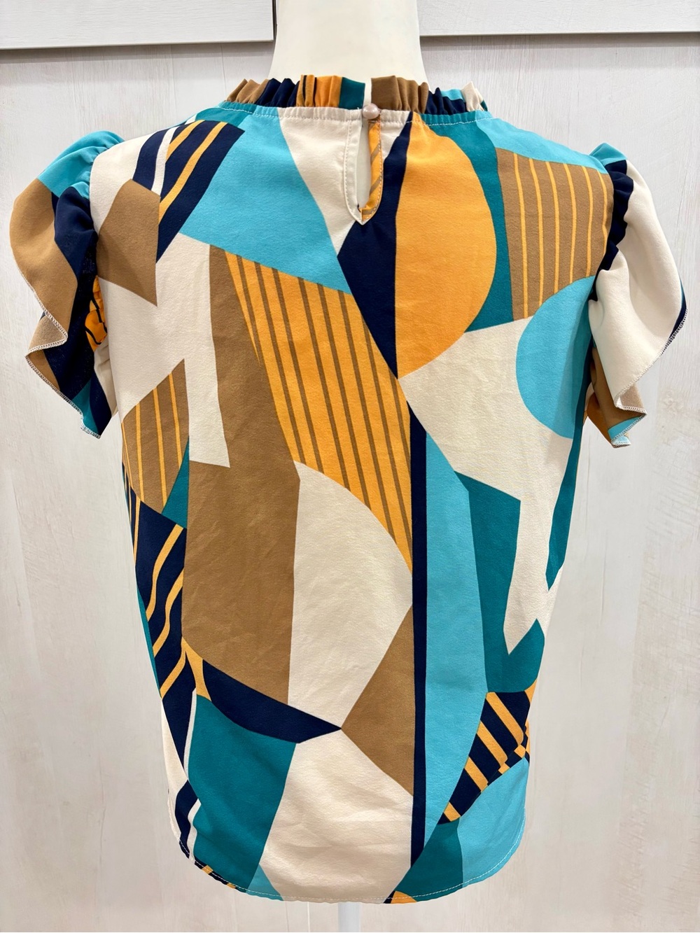 Geometric Pattern Ruffle Short Sleeve Blouse Blue Navy Orange Brown - Picture 3 of 5